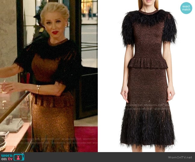 Michael Kors Feather Embellished Metallic Peplum Sweater Dress worn by  Gloria Grandbilt (Katherine LaNasa) on Katy Keene