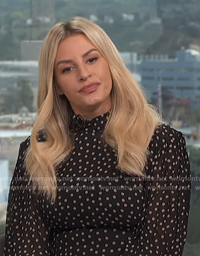 Morgan’s black polka dot blouse on E! News Daily Pop