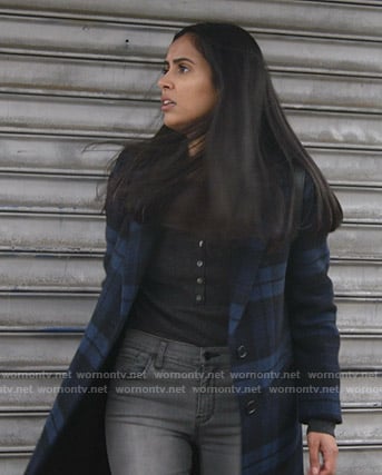 Saanvi's blue plaid coat on Manifest