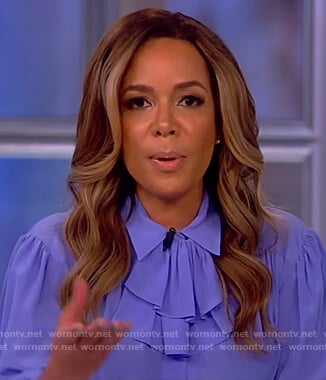 Sunny’s blue ruffle neck blouse on The View