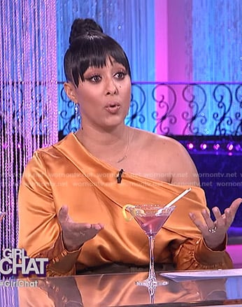 Tamera’s orange satin asymmetric top on The Real