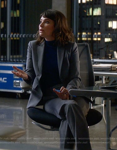 Taylor’s grey suit on Bull