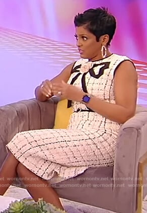 Tamron’s white tweed sleeveless dress on Tamron Hall Show