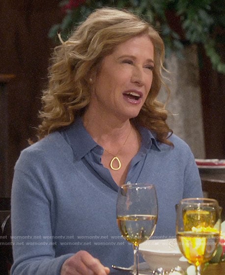 Vanessa's blue v-neck sweater and button down blouse on Last Man Standing