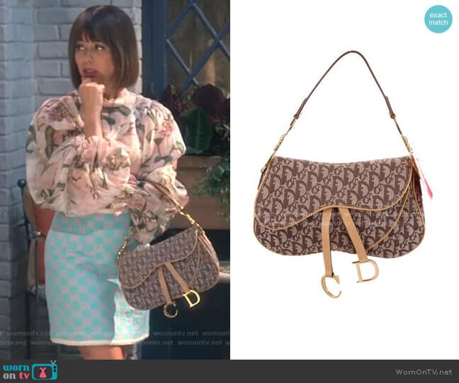 Oblique Double Saddle Bag by Christian Dior worn by Elizabeth (Natasha Leggero) on Broke