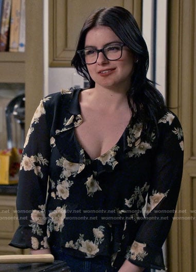 Alex’s black floral ruffled top on Modern Family