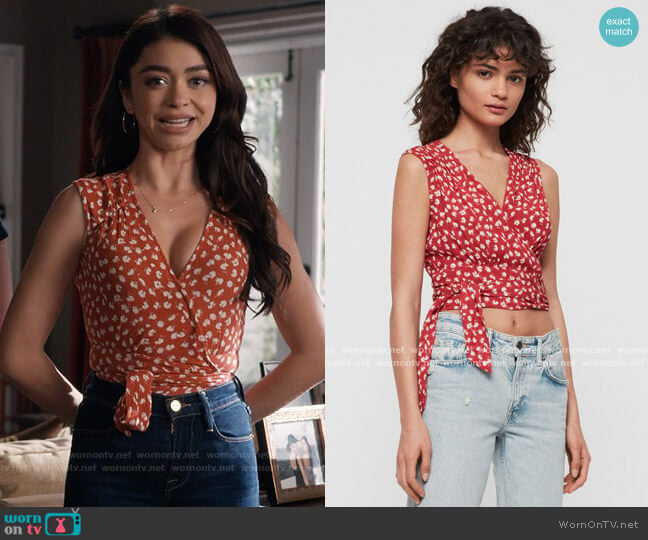 Haley’s red floral wrap top on Modern Family