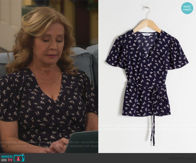 Floral Wrap Blouse by & Other Stories worn by Vanessa Baxter (Nancy Travis) on Last Man Standing