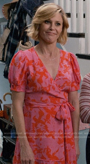 Claire’s pink and red printed wrap dress on Modern Family