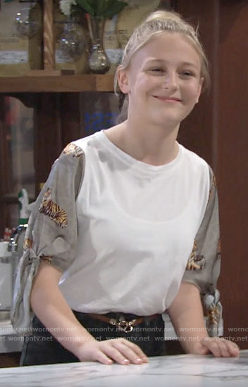 Faith’s white top with tiger print sleeves on The Young and the Restless
