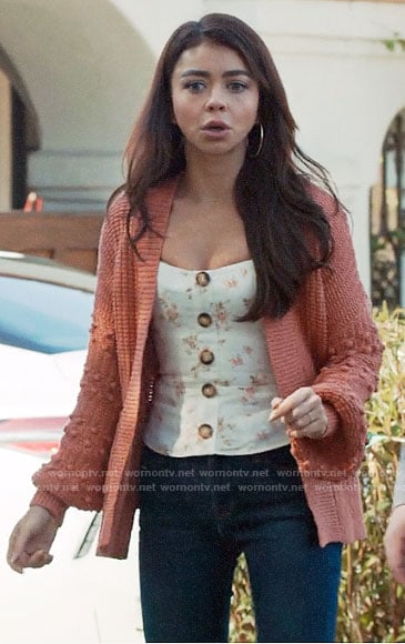 Haley's pink bobble cardigan and floral top on Modern Family