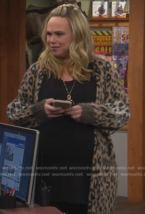 Kristin's leopard fuzzy cardigan on Last Man Standing