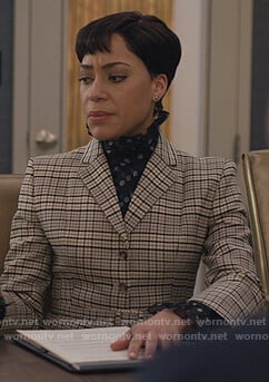 Lucca's polka dot blouse and plaid blazer on The Good Fight