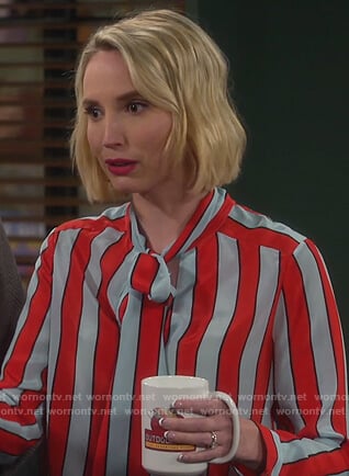 Mandy's stripe tie neck blouse on Last Man Standing