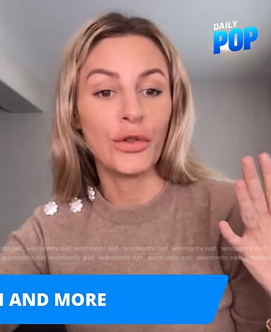 Morgan’s beige embellished button sweater on E! News Daily Pop