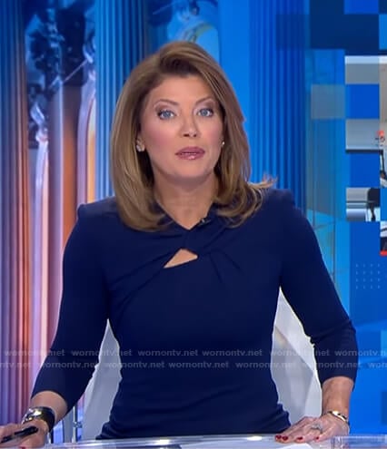 Norah’s navy knotted neck dress on CBS Evening News