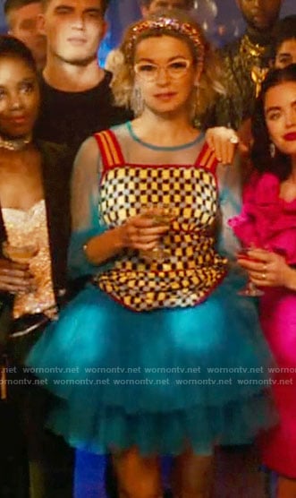 Pepper's blue tulle dress and checked knit top on Katy Keene