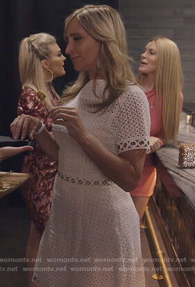 Sonja's white eyelet grommet dress on The Real Housewives of New York City