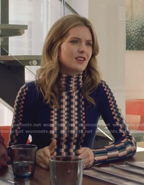 Sutton’s blue check turtleneck sweater on The Bold Type