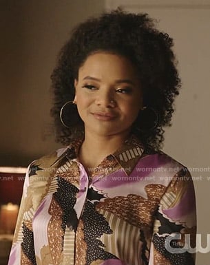 Vanessa's abstract print blouse and jeans on Dynasty