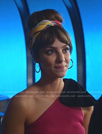 Zari's pink one-shoulder top with black bow on Legends of Tomorrow