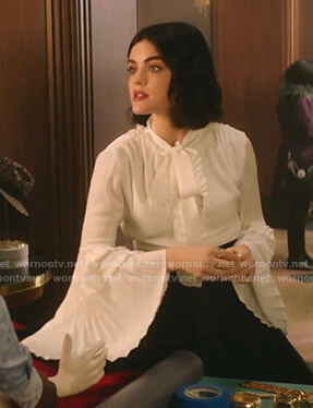 Katy's white tie neck pleated bell sleeve blouse on Katy Keene