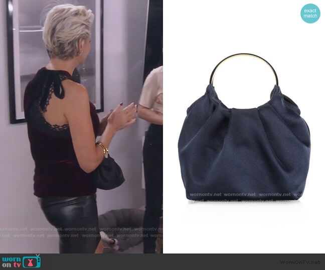 Micro Satin Double Circle Bag by The Row worn by Dorinda Medley  on The Real Housewives of New York City