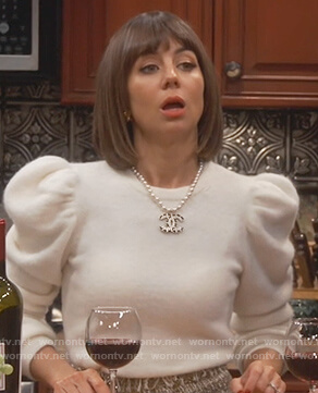 Elizabeth's white puff shoulder sweater on Broke