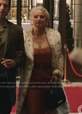 Gloria's white animal print fur coat on Katy Keene