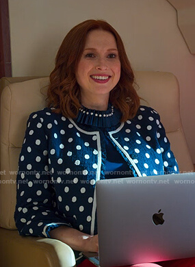 Kimmy's blue pleated neck top and polka dot jacket on Unbreakable Kimmy Schmidt