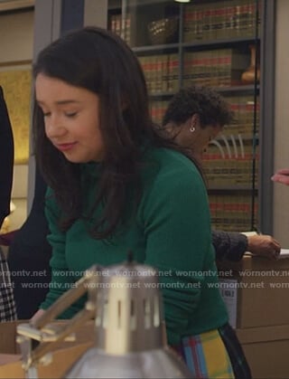 Marissa’s multicolored plaid skirt and sweater on The Good Fight