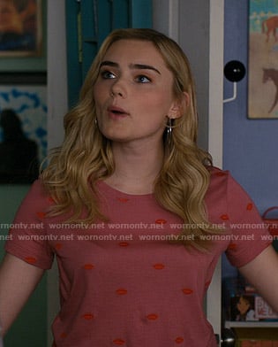 Taylor's pink embroidered lip tee on American Housewife