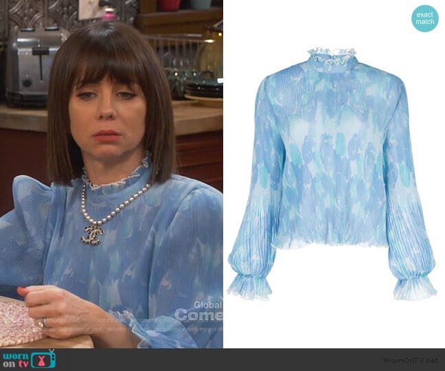 Elizabeth’s blue floral pleated blouse on Broke