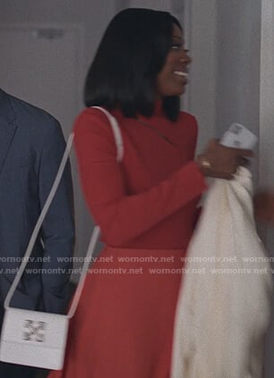 Molly's white cross body bag on Insecure