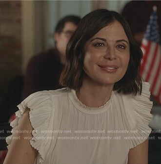 Cassie's white pleated ruffle short sleeve top on Good Witch