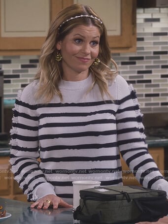 DJ's white striped sweater with trim on Fuller House
