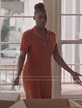 Issa's orange velvet jumpsuit on Insecure
