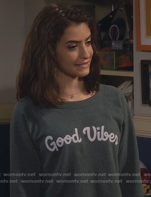 Ramona's green Good Vibes sweatshirt on Fuller House