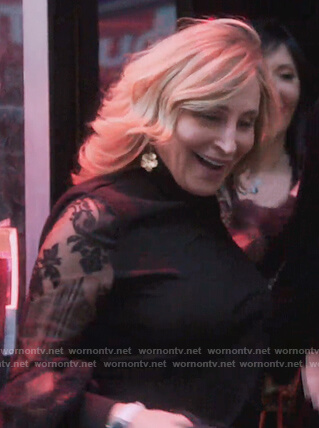 Sonja’s black floral lace sleeve blouse on The Real Housewives of New York City
