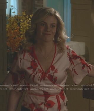 Stephanie’s pink floral wrap top on Good Witch