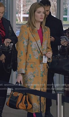 Sutton’s orange floral coat on The Bold Type