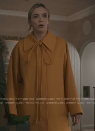 Villanelle's yellow tie neck coat on Killing Eve