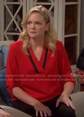 Belle's red contrast v-neck blouse on Days of our Lives