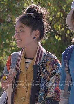 Claudia's mixed print bomber jacket on The Baby-Sitters Club