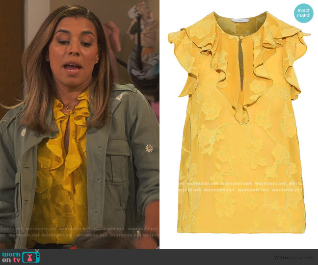 Joe’s yellow ruffle top on United We Fall