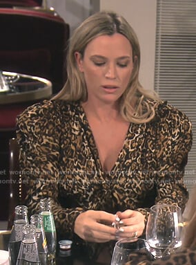 Teddi’s leopard puff sleeve dress on The Real Housewives of Beverly Hills