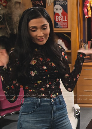 Ava Page’s black floral ruched top on The Expanding Universe of Ashley Garcia