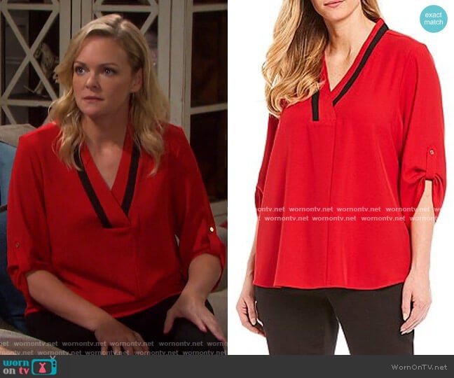 Contrast V-Neck Roll-Tab Sleeve Top by Calvin Klein worn by Belle Brady (Martha Madison) on Days of our Lives