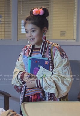 Claudia’s mixed print bomber jacket on The Baby-Sitters Club