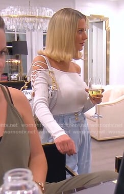 Dorit's white lace-up sleeve top and jeans on The Real Housewives of Beverly Hills